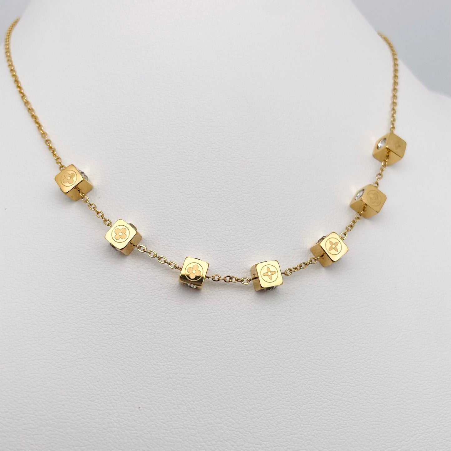 Collier Dé