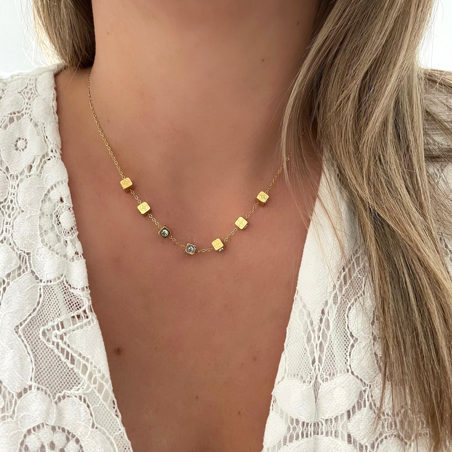Collier Dé
