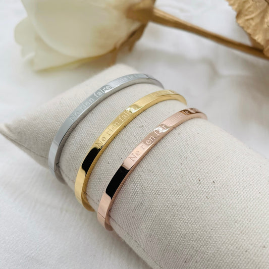Bracelet message "NE RIEN FAIRE,MAIS LE FAIRE BIEN"