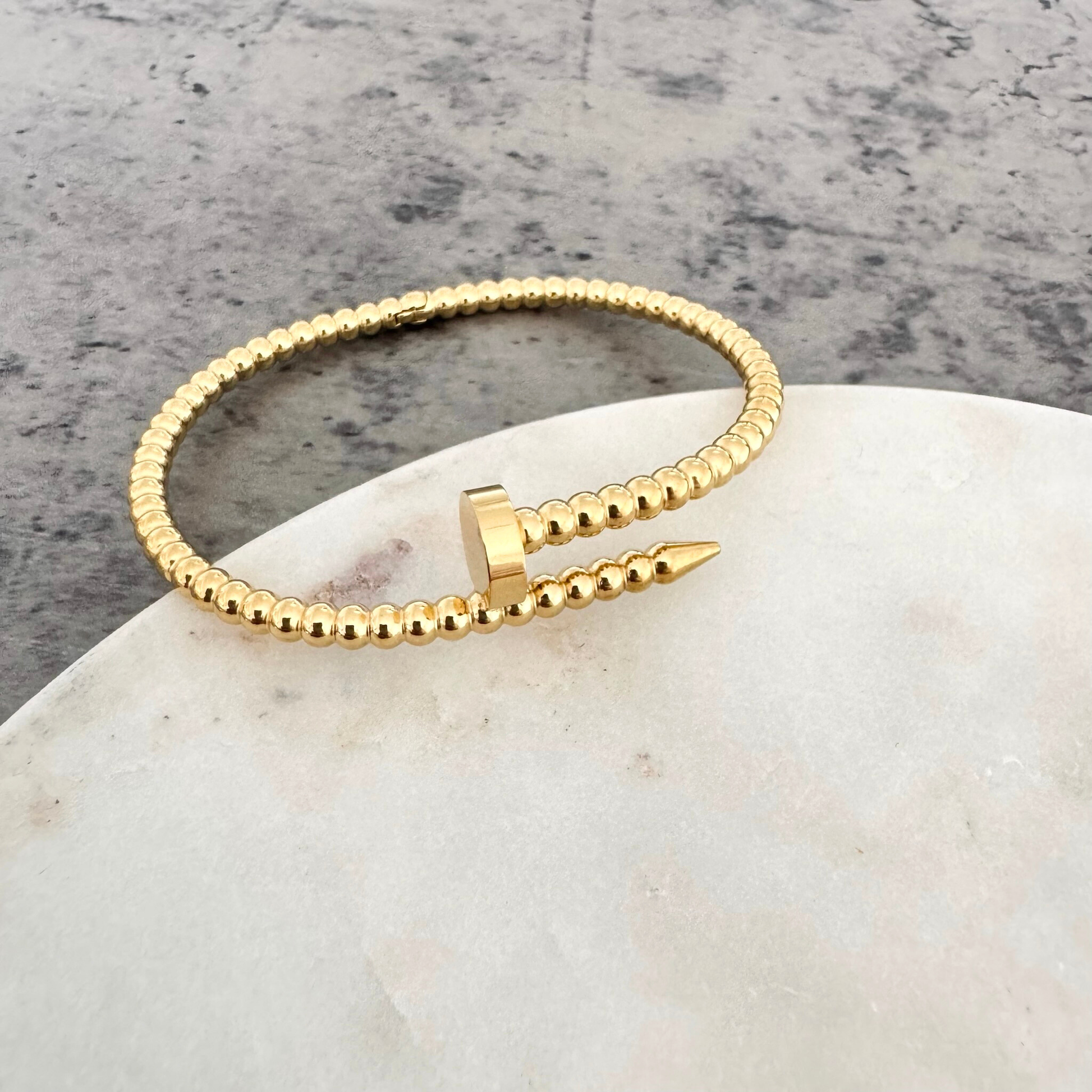 Bracelet jonc Clou Perla doré