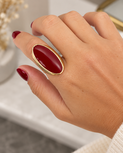 Bague dorée ovale rouge