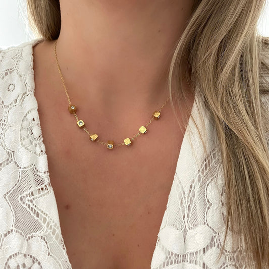 Collier Dé