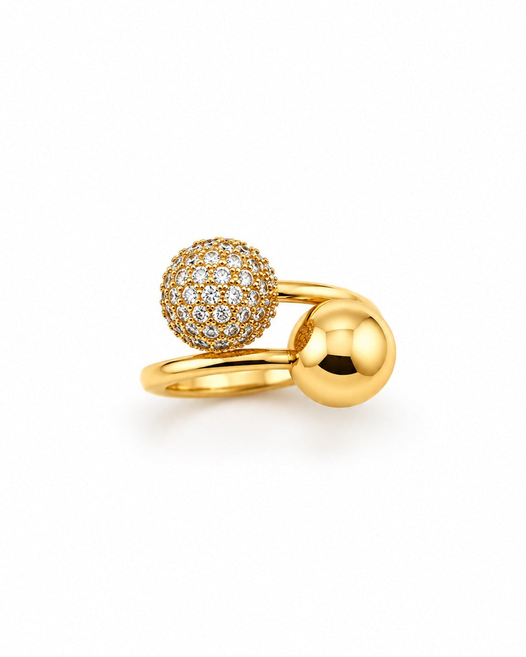 Bague dorée boules zirconiums
