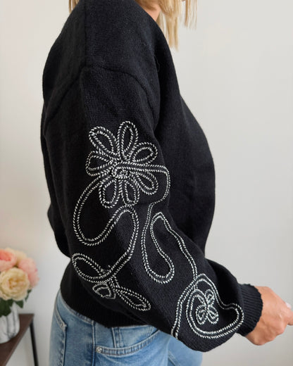 Pull manches brodé noir