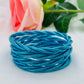 Jonc Bouddhiste torsadé bleu pailleté